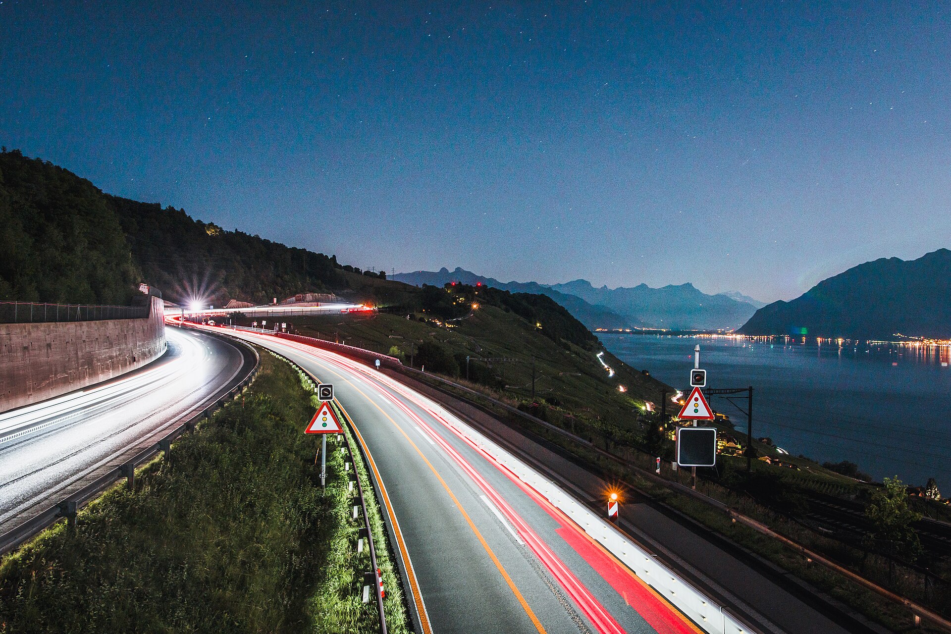 Highway at night with light streaks